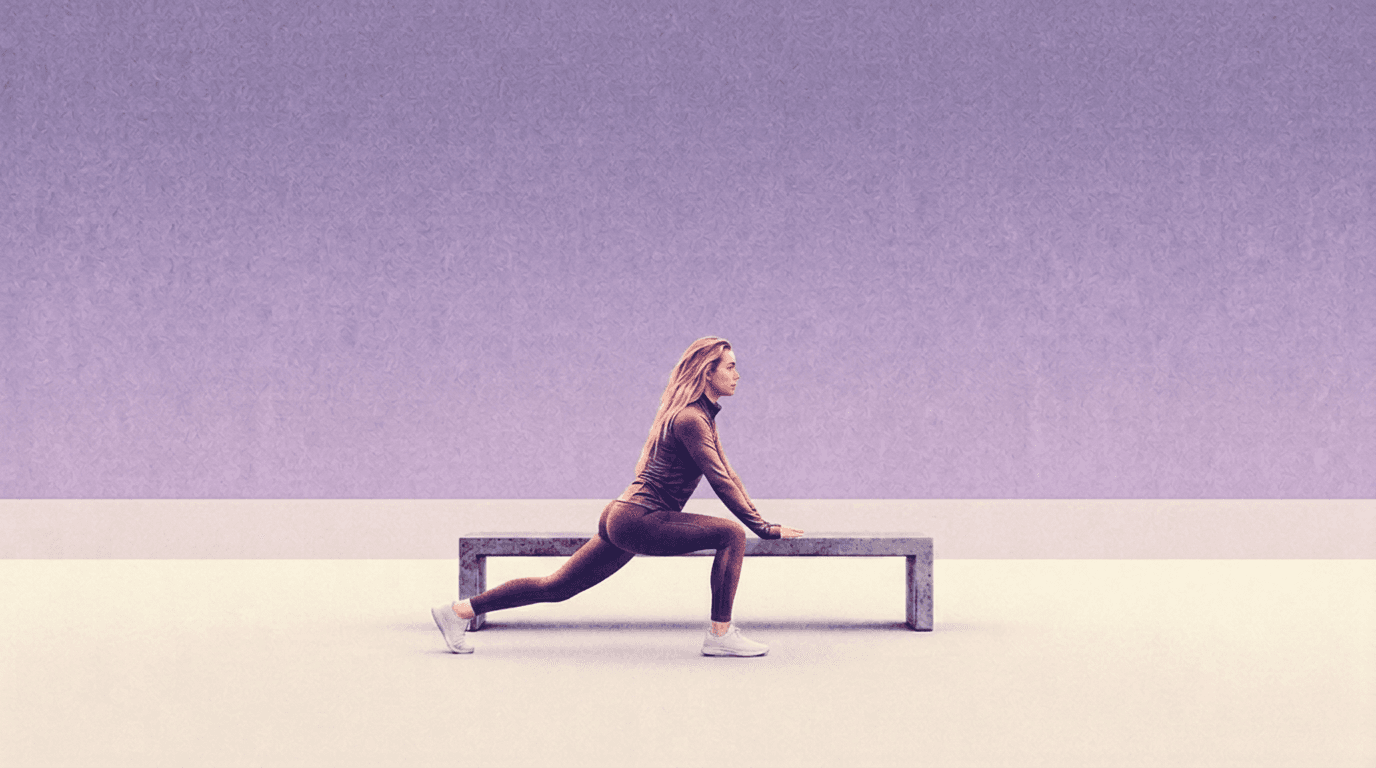 Founder stretching by a concrete bench at dawn.